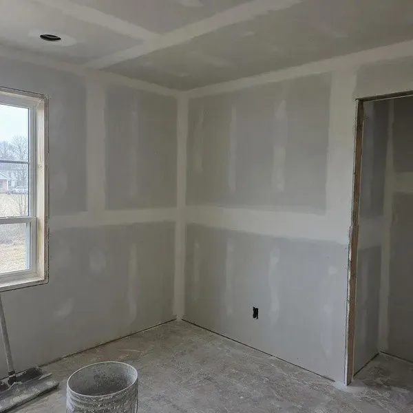 Sanded drywall joints ready for primer after a Level 4 finish